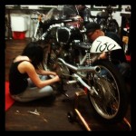 Nean working with her fiancee Sean on getting a moto ready for vintage races!