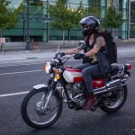 An old scrambler and motorcycle lady in Portland