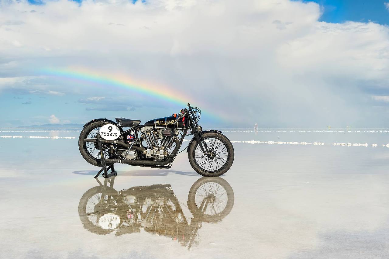 A rainbow with the Brough Superior vintage motorcycle on the Bonneville Salt Flats, UT