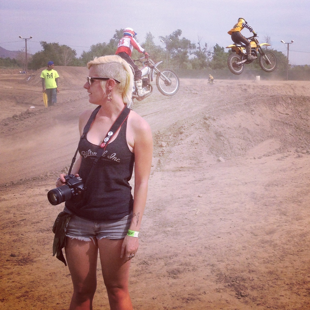 Alicia of MotoLady in true form, mouth agape watching awesome 2strokes fly over the jumps