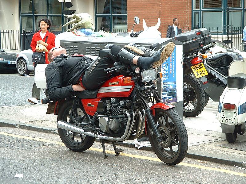 London motorcycle courier standing by - Crispy (flickr)