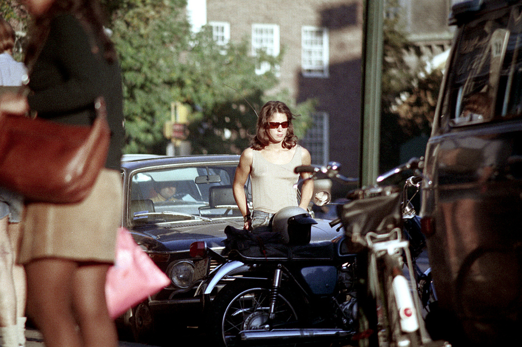 1971, a girl and her motorcycle, Harvard Square, Cambridge. 
