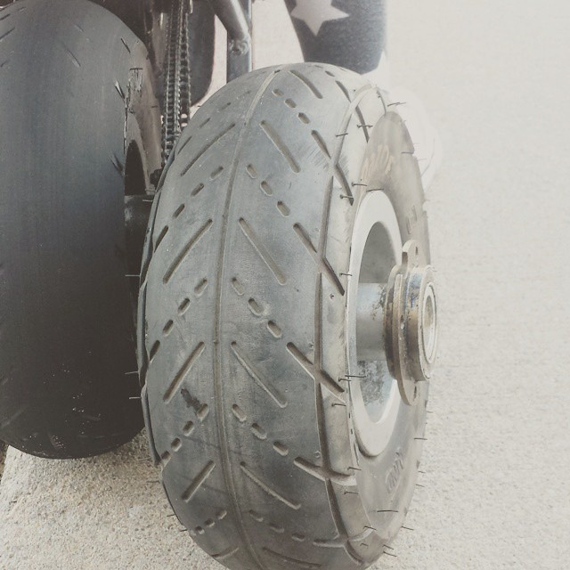 Kymmee's tire after shredding (left) compared to new (right) 