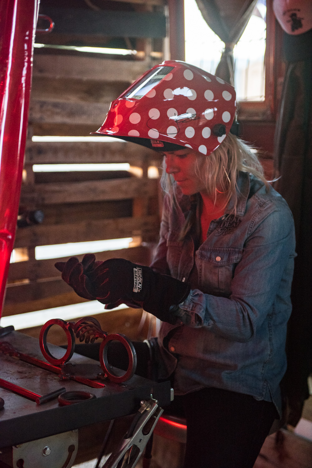 Jessi Combs fabricating trophies at Babes Ride Out
